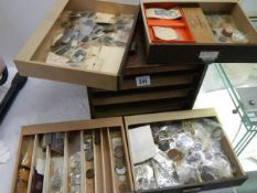 A four drawer cabinet containing a good lot of interesting coins.