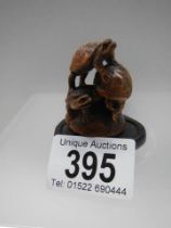 A late Victorian signed wooden netsuke.