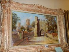 An oil on canvas Lincoln scene signed Gordon Lees, Frame 68 x 47 cm, Image 49 x 29 cm. COLLECT ONLY.