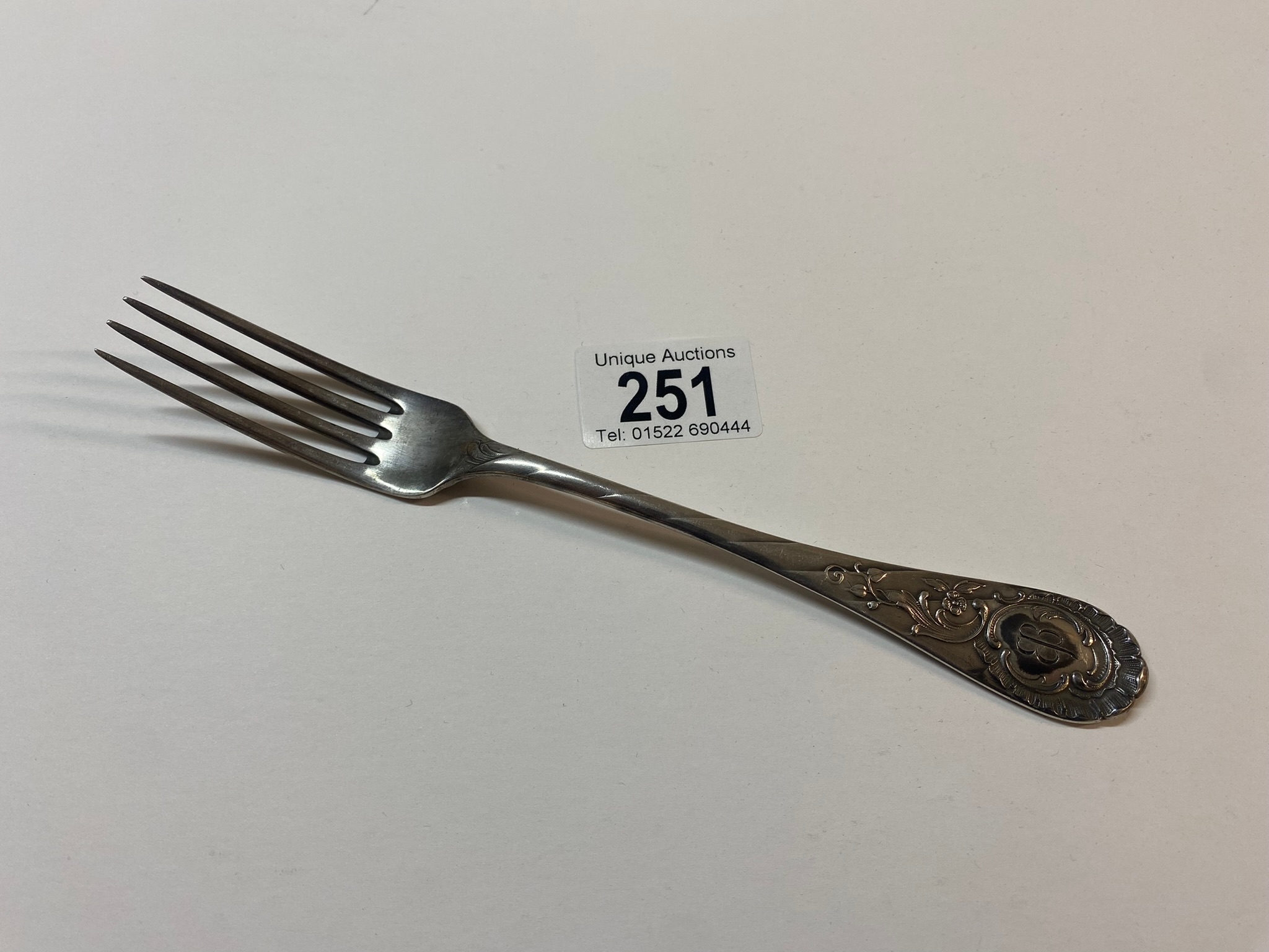An original silverware fork originally belonging to Eva Braun marked EB, 800 Silver, (approx 56g)