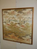 A framed Chinese silk depicting birds. COLLECT ONLY.