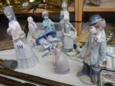 Eight assorted figures including Lladro.