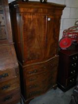 A two door mahogany cocktail cabinet, COLLECT ONLY.