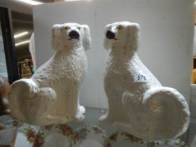 A pair of early 20th century Staffordshire spaniels.