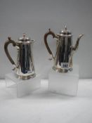 A George Howson silver coffee pot and water pot, Sheffield 1934 (approximately 280 grams).