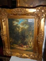 A gilt double swept framed woodland scene with horses, COLLECT ONLY.