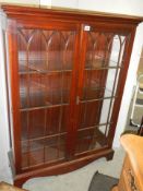 A mid 20th century mahogany display cabinet, COLLECT ONLY.