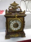 A good quality Victorian bracket clock with brass fittings,