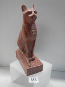 A red granite figure of Egyptian cat god Bastet,