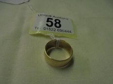 A 9ct gold wedding ring, size M, 3.6 grams.