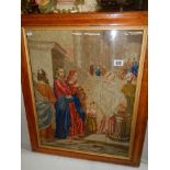 An early framed and glazed religious tapestry. COLLECT ONLY.