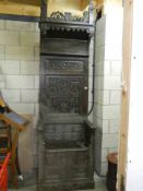 A heavily carved period high backed throne style chair, COLLECT ONLY.