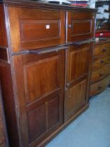 A mahogany four door cupboard with pull out slides, COLLECT ONLY.