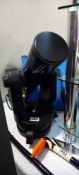 A Meade EXT-80 in carrying bag (missing tripod legs)