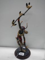 A mid 20th century bronze figure of an American Indian warrior.
