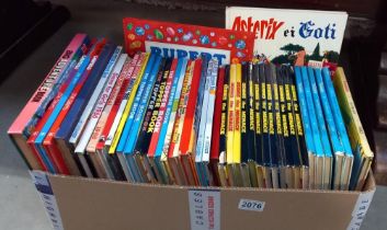 A quantity of annuals including Topper, Blue Peter. Twinkle, Asterix & Goti COLLECT ONLY