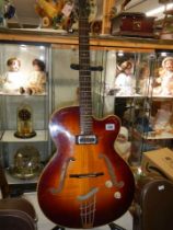 A Hofner Senator Brun E1 thin 1950's electro/acoustic guitar, original pick guard, brown hard case.