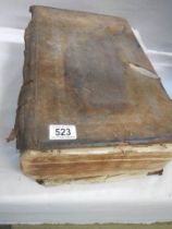 An early 18th century Bible, some pages need attention but in fair condition for age.