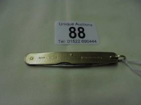 A 9ct gold pen knife,