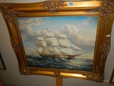 A gilt framed oil on canvas seascape with tall ship, COLLECT ONLY.