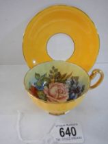 An Aynsley Cabbage Rose pattern tea cup and saucer signed J A Bailey (saucer has slight fault.)