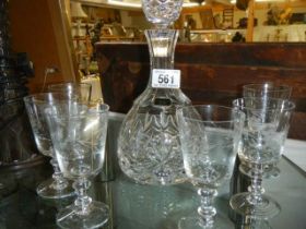 A mid 20th century cut glass decanter and six glasses.