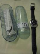 A cased Swatch Irony diaphane chronograph wrist watch.