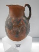 A central American Provenance red terracotta jug.