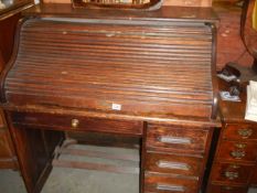 An early 20th century roll top desk, COLLECT ONLY.