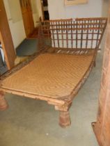 A good quality Egyptian style wood and brass bed, COLLECT ONLY.