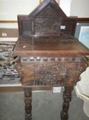 An early carved oak 'Credence' table dated 1629, COLLECT ONLY.
