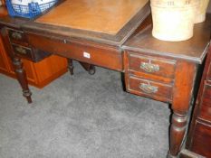 An early 20th century mahogany desk with sloping top and two drawers, COLLECT ONLY.