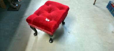 A red plush footstool COLLECT ONLY