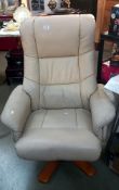 A leather swivel chair in a cream colour COLLECT ONLY
