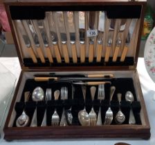 An Edwardian oak cased canteen of cutlery (approx 39 pieces)