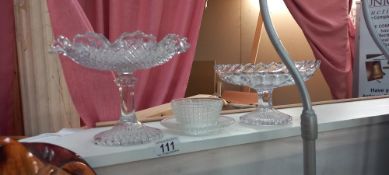 2 glass comports and a dish