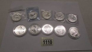 10 1 oz .999 silver Britannia coins, various dates.