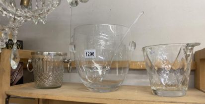 A punch bowl and ladel and 2 glass ice buckets