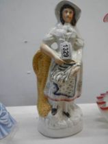 A 19th century Staffordshire figure.