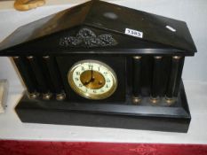 A heavy slate paladian style mantle clock, COLLECT ONLY.