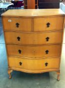 A good quality mid 20th century two over three serpentine chest of drawers, COLLECT ONLY