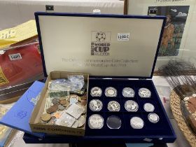 A collection of silver World Cup 90 coins and other coins including notes