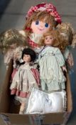 A quantity of collectors dolls