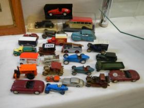 A mixed lot of die cast vehicles.