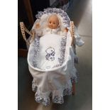 A doll in a Moses basket, COLLECT ONLY.