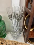 6 hand held footless champagne glasses and matching jug COLLECT ONLY