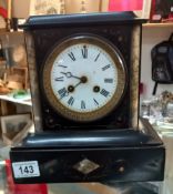 An Edwardian black slate mantle clock