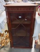 A mahogany astragal glazed corner cabinet. COLLECT ONLY