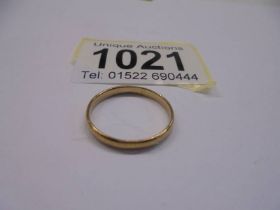 A 22 ct gold wedding ring, size M, 1.9 grams.