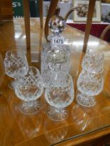 A cut glass decanter with silver whisky label and five brandy goblets, COLLECT ONLY.